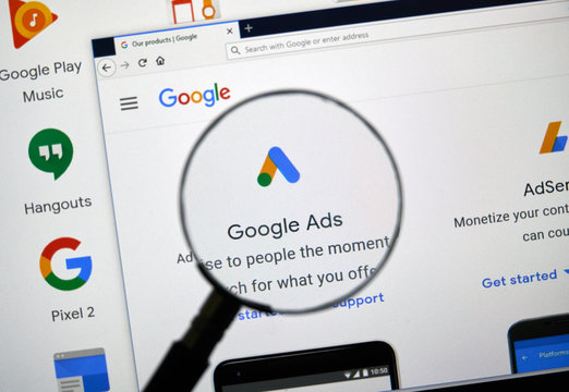 Google Ads interface displayed on a computer screen, magnified view highlighting the Google Ads logo and text, emphasizing digital marketing solutions for business growth.